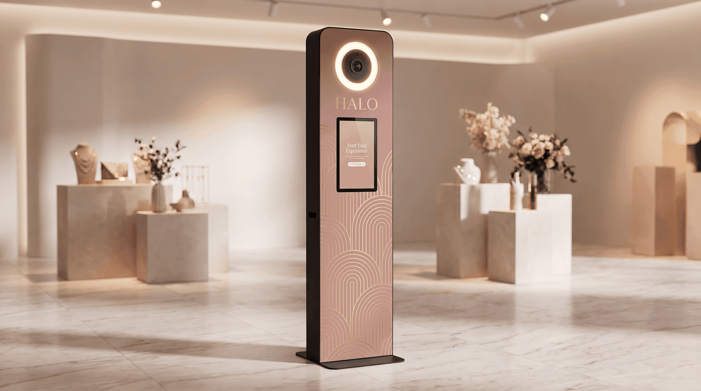 A portrait station totem wrapped in a rose and gold beauty brand in a retail space.